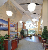 The hospital lobby features historic maps of the Portsmouth area and artwork from local artists. (Photo: JSA Inc.) hospital construction facility management energy