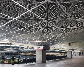 With a 70% open area rate, the metal tiles used in this major league ballpark meet code to allow sprinkler heads to remain hidden yet functional. (Photo: pinta acoustic, inc.) facility management interiors ceilings acoustics sports park